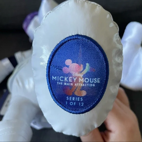 Loungefly Disney Space Mountain MMMA backpack and plush